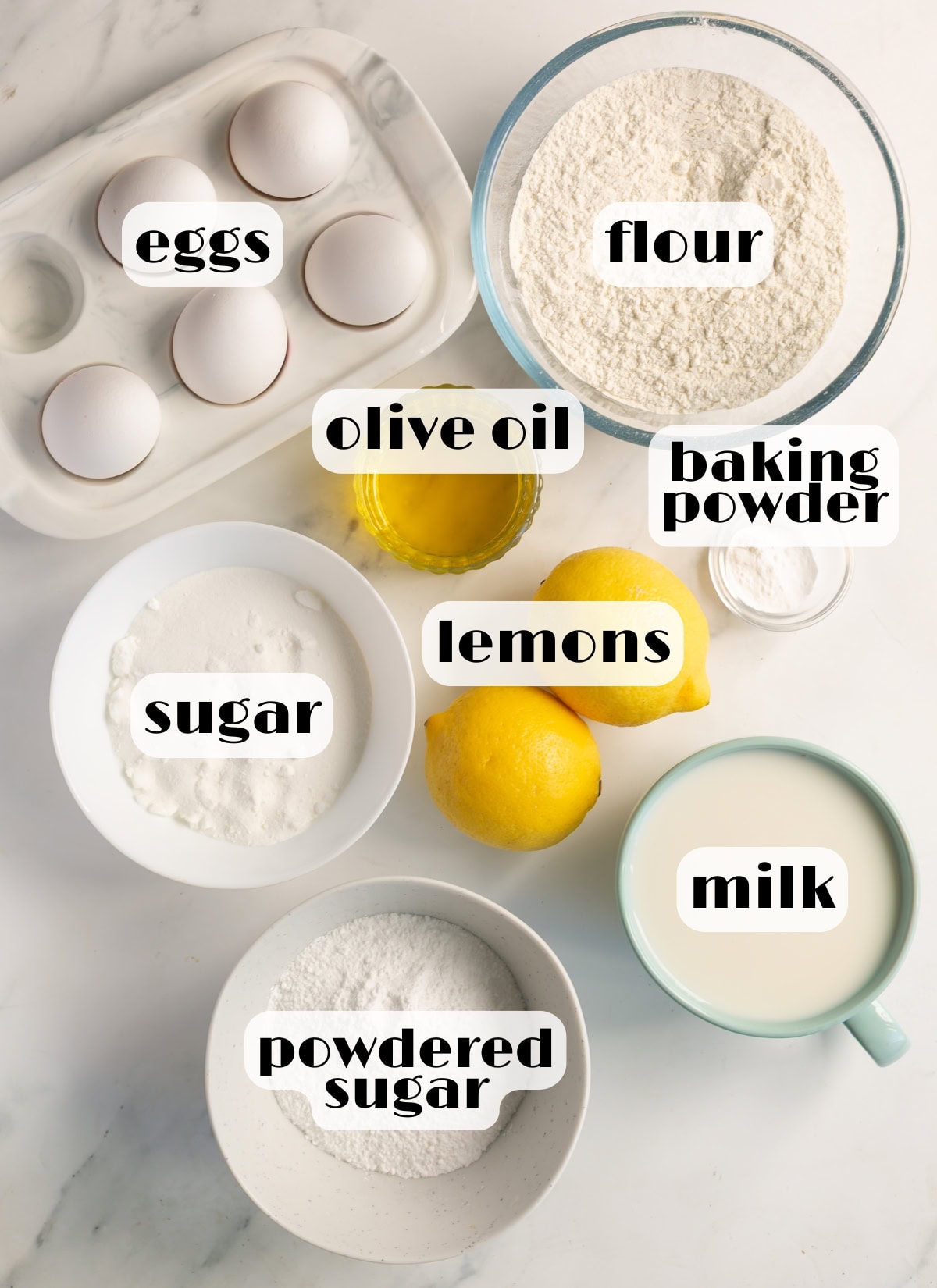 lemon cream cookies ingredients: flour, lemons, sugar, powdered sugar, eggs, milk, baking powder, olive oil.