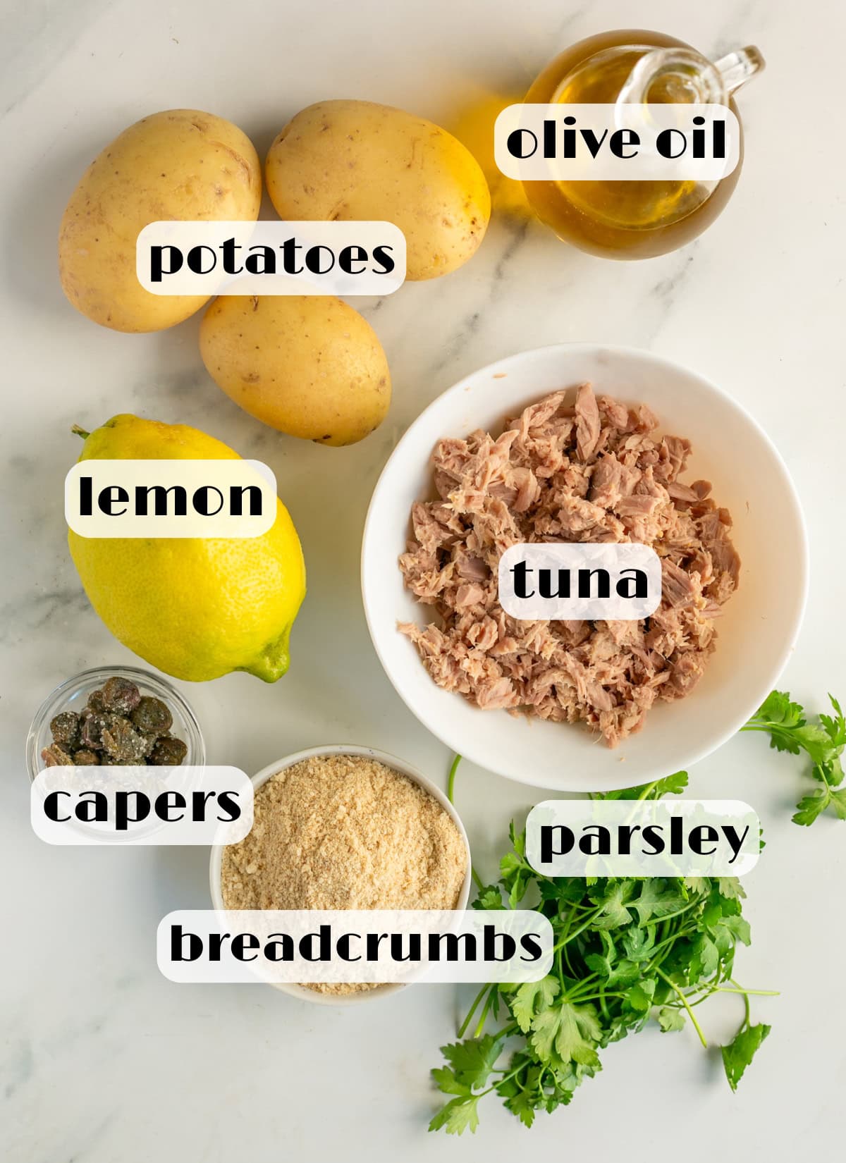 tuna meatballs ingredients: canned tuna, breadcrumbs, potatoes, parsley, capers, lemon zest, olive oil.