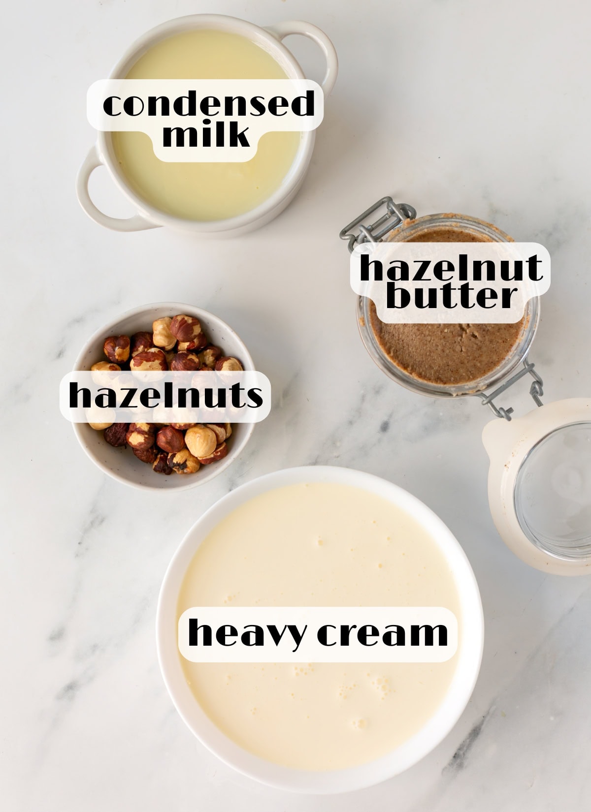 Ingredients for hazelnut ice cream: heavy cream, hazelnut butter, condensed milk.