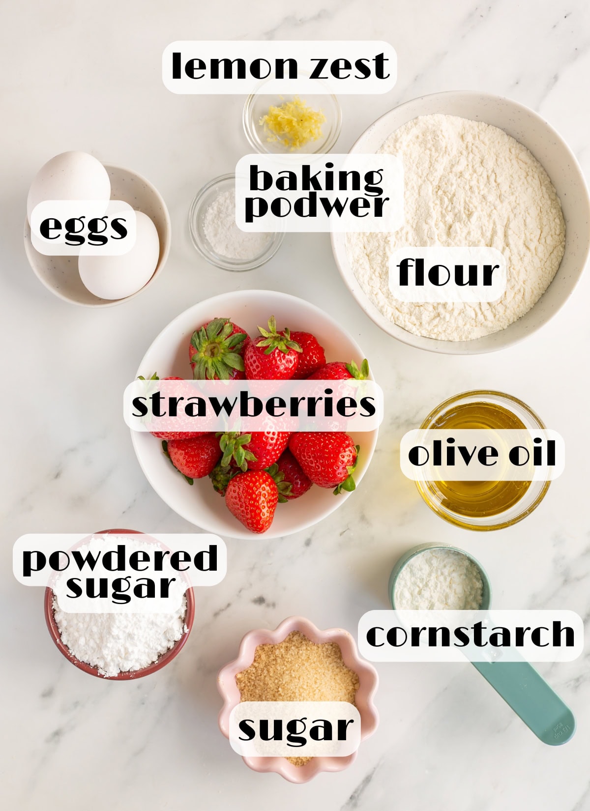 strawberry crostata ingredients: strawberries, powdered sugar, sugar, flour, olive oil, cornstarch, baking powder, lemon zest, eggs.