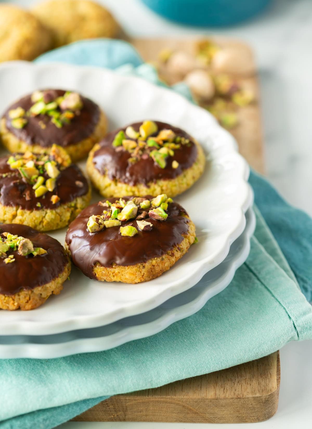italian pistachio cookies topped with chocolate.