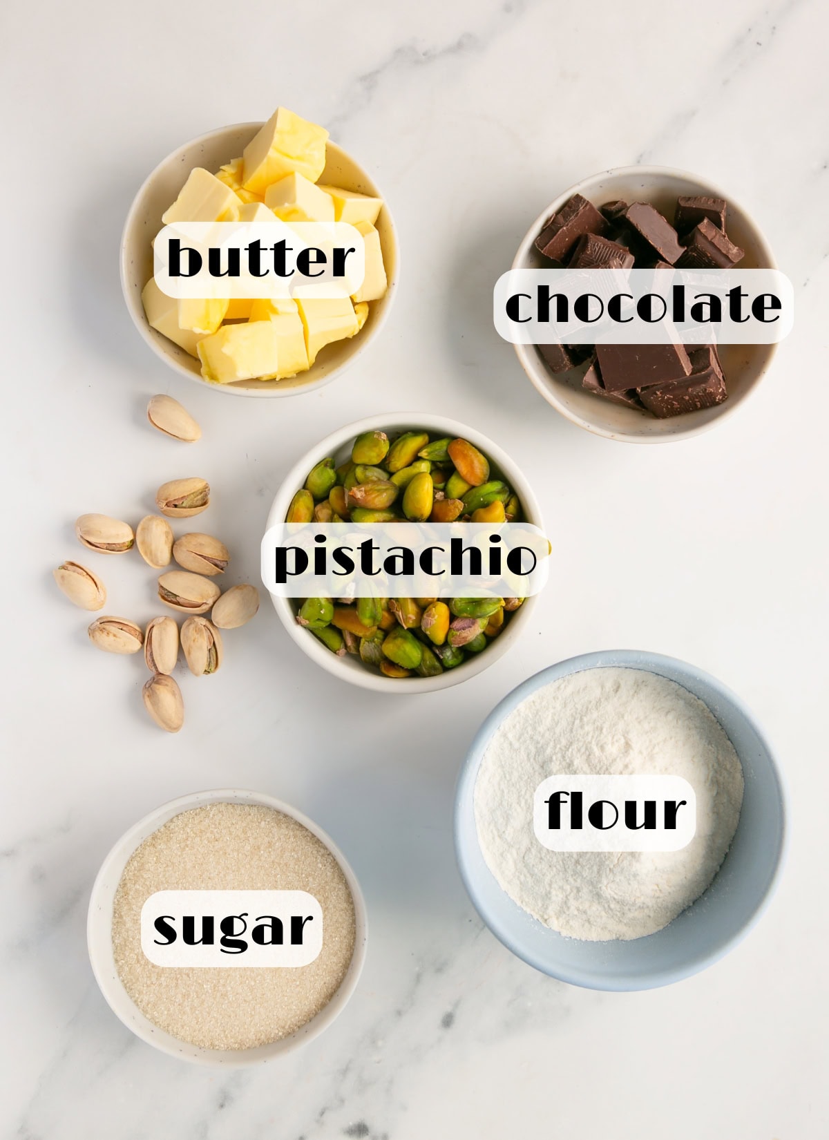 pistachio cookie ingredients: pistachios, flour, butter, chocolate, flour.